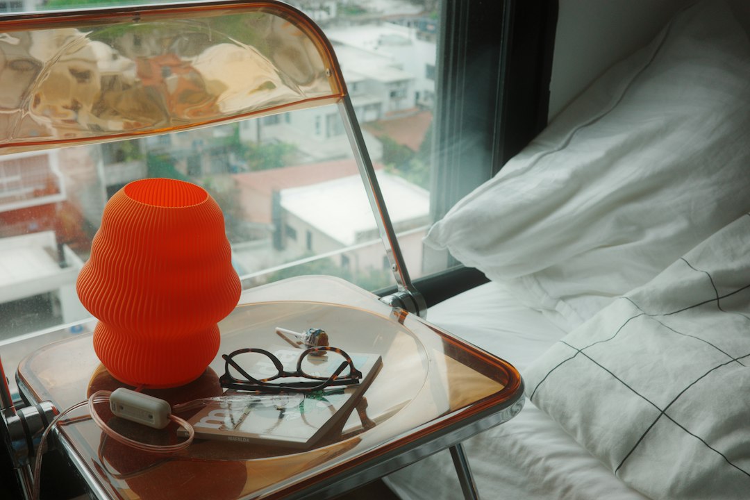 Perimenopause self-care routine cover illustration with water glass, scarf, small fan, and journal